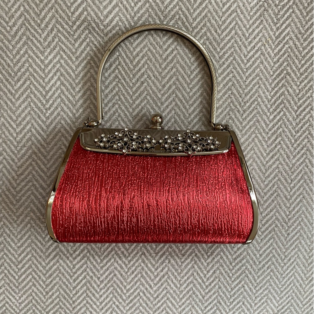 Chic Red Clutch with Silver Accents and Top Handle